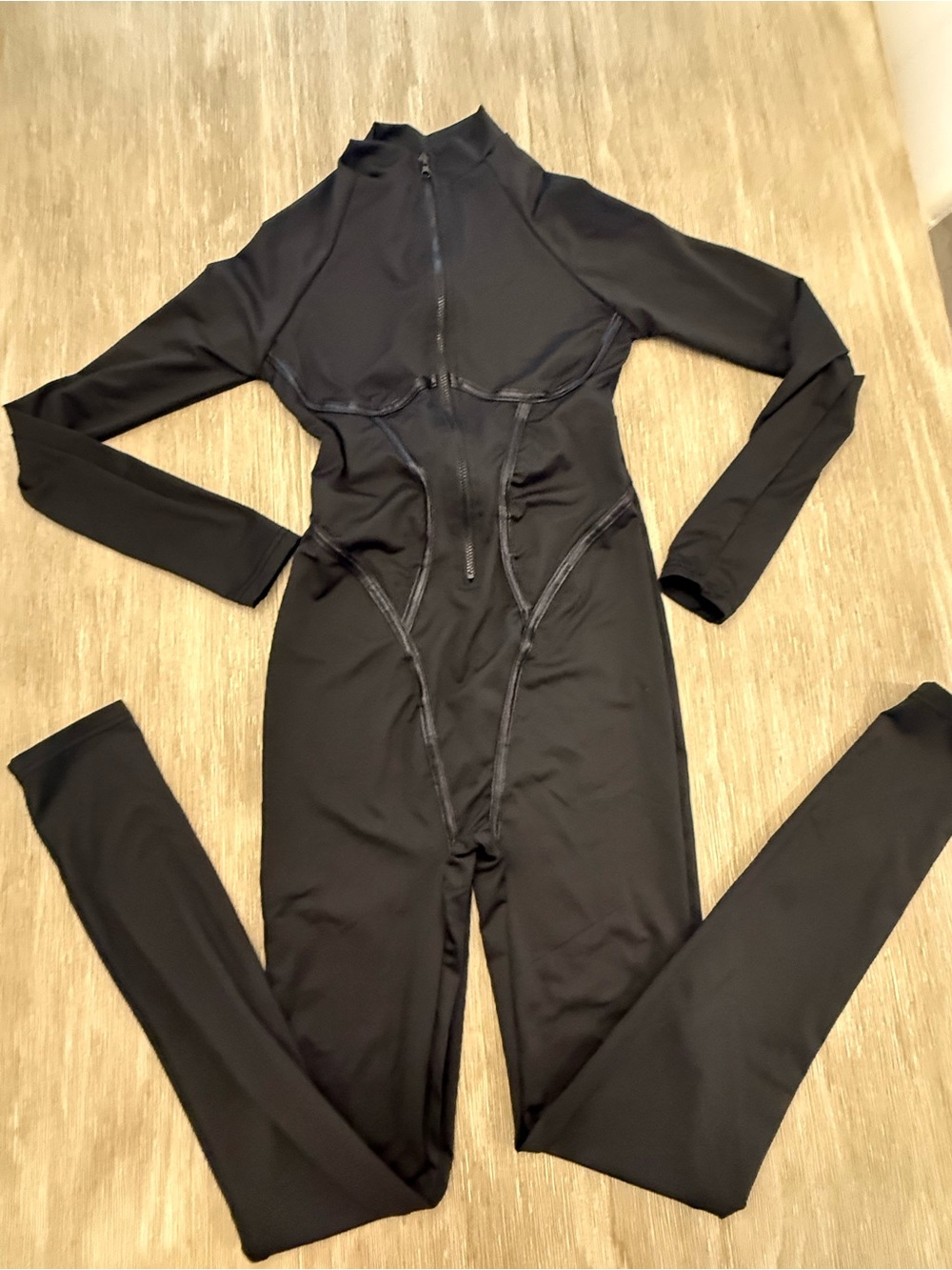 Sexy bodysuit / catsuit with faux leather piping